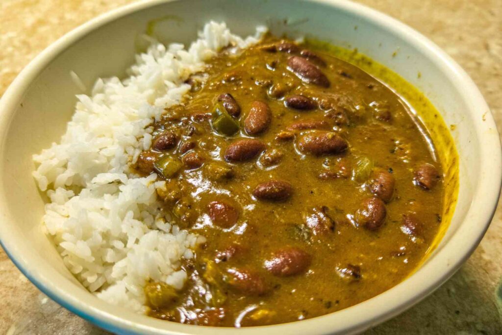 Red beans and rice simmering in pot on stovetop