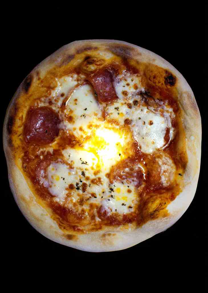 Rolled homemade pizza dough easy recipe on floured counter