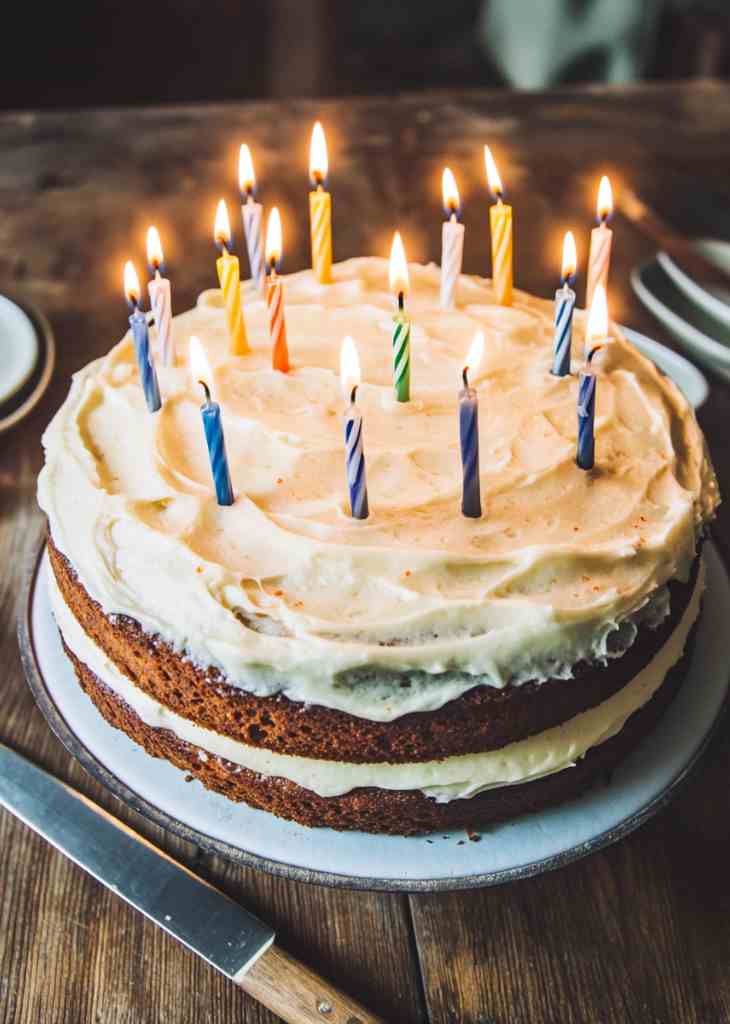 Carrot cake birthday cake layers with frosting ready for assembly