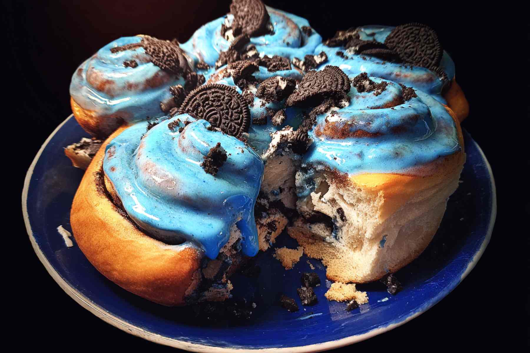 Unbaked Cookie Monster Cinnamon Rolls in baking dish
