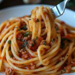 One pot spaghetti recipe simmering in large pot on stove